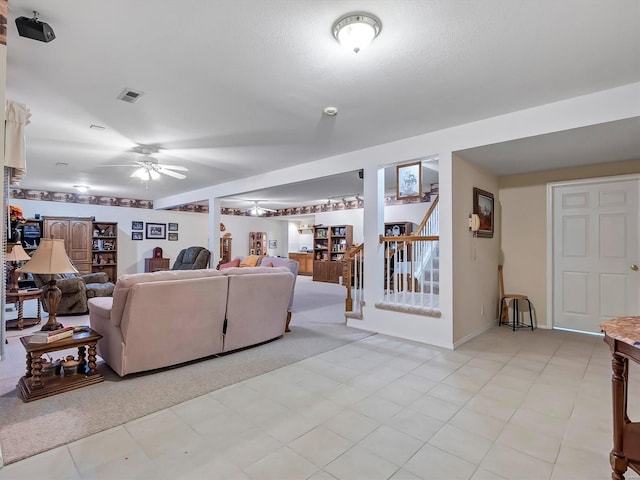 living room featuring ceiling fan