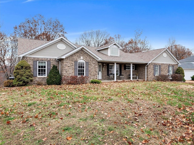 ranch-style house featuring a front lawn