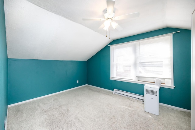 bonus room with carpet, baseboard heating, lofted ceiling, and ceiling fan