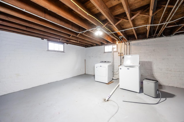 basement with separate washer and dryer