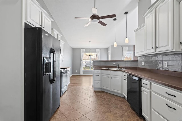 kitchen featuring black appliances, white cabinets, ceiling fan with notable chandelier, tile patterned flooring, and decorative light fixtures