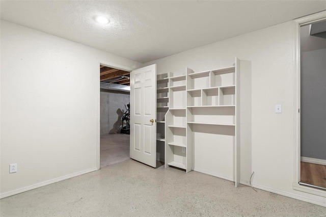 unfurnished bedroom with a textured ceiling