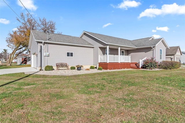 view of property exterior featuring a porch and a lawn