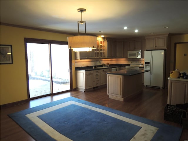 kitchen with sink, stainless steel range with electric stovetop, decorative light fixtures, a kitchen island, and white refrigerator with ice dispenser