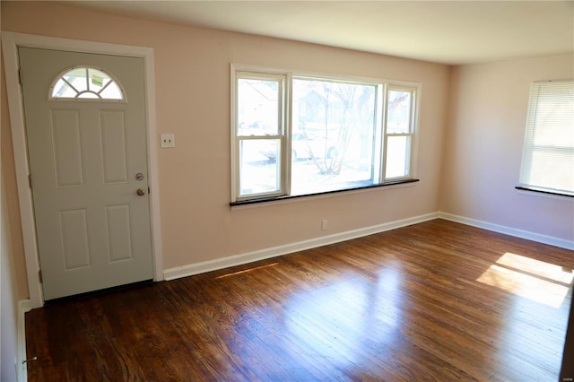 foyer entrance featuring dark hardwood / wood-style floors