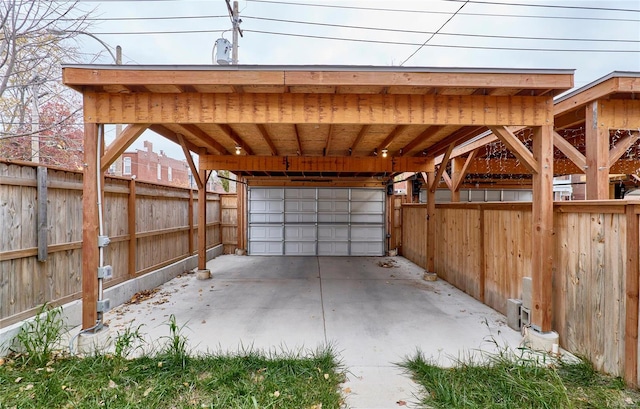 garage featuring a carport