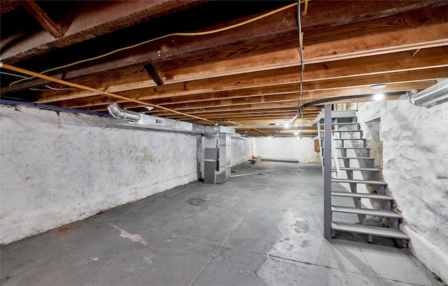 basement featuring heating unit