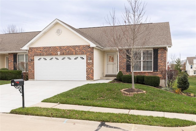 single story home with a front yard and a garage