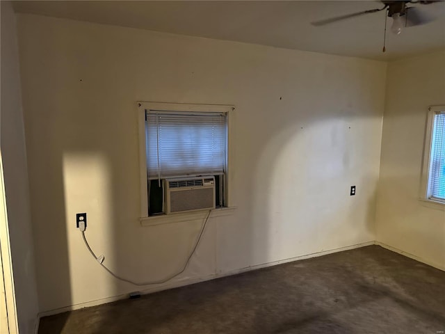 carpeted empty room with ceiling fan and cooling unit