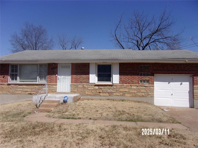 ranch-style home featuring brick siding, roof with shingles, a garage, stone siding, and driveway