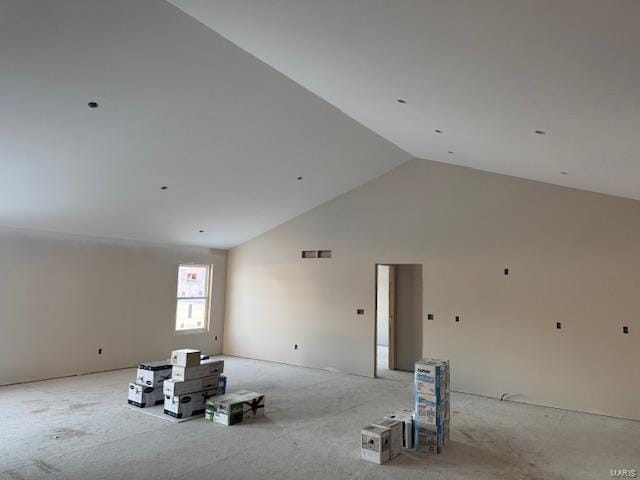 empty room with high vaulted ceiling