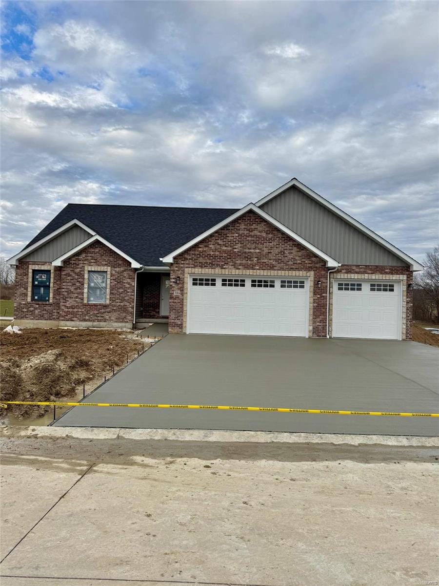 view of front of home with a garage