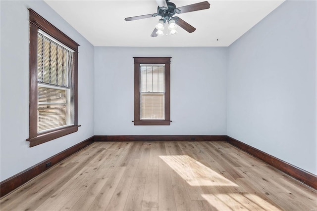 unfurnished room featuring ceiling fan and light hardwood / wood-style floors