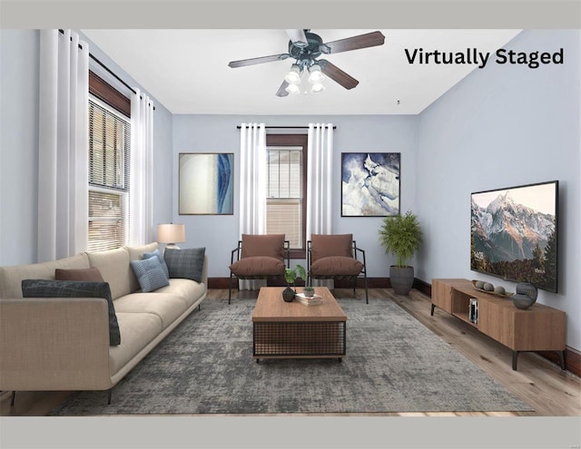 living room featuring ceiling fan and dark wood-type flooring