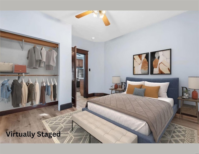 bedroom with ceiling fan, a closet, and light hardwood / wood-style flooring