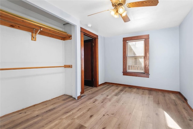 unfurnished bedroom with light wood-type flooring, a closet, and ceiling fan