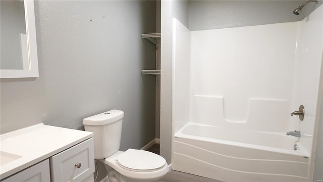 full bathroom with vanity, toilet, and shower / washtub combination