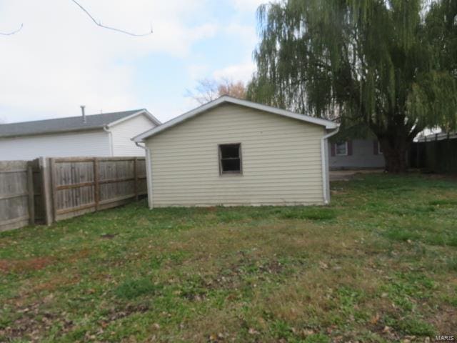 exterior space with a yard