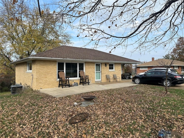 back of house featuring a patio and central AC unit