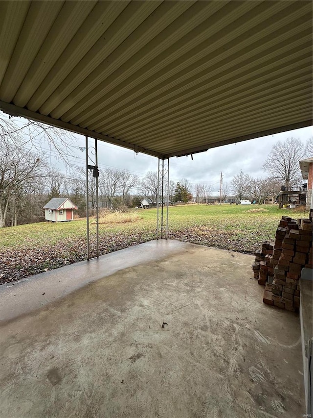 view of patio featuring an outdoor structure