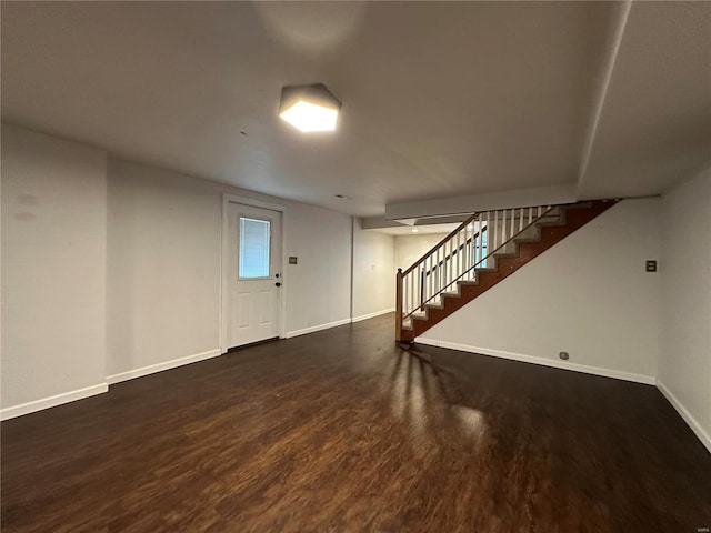 foyer featuring dark wood-type flooring