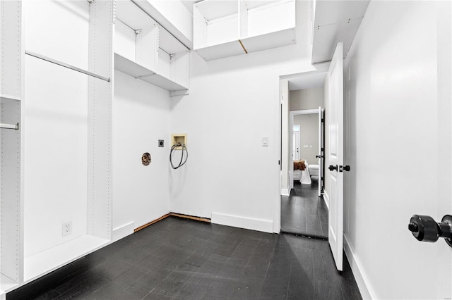 clothes washing area with hookup for an electric dryer and hookup for a washing machine