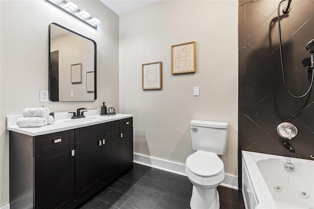 full bathroom featuring vanity, toilet, and tiled shower / bath