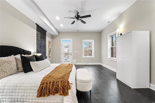 bedroom with access to exterior, ceiling fan, and dark wood-type flooring