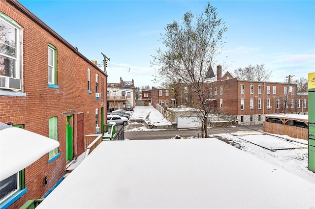 view of yard covered in snow