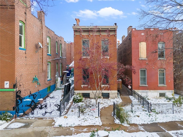 view of snow covered property