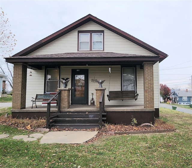 bungalow-style home featuring a porch