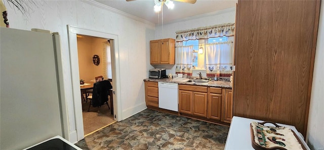 kitchen featuring white appliances, ceiling fan, ornamental molding, and sink