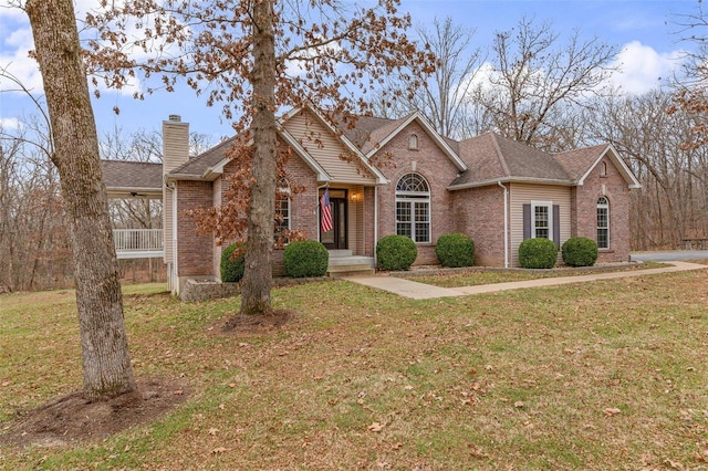 ranch-style house featuring a front lawn