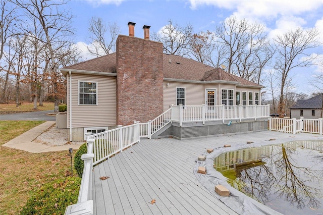 rear view of house with a deck