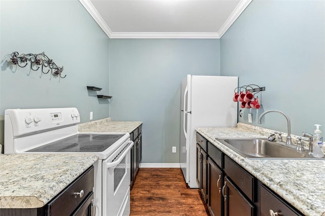 kitchen featuring ornamental molding, dark brown cabinets, white appliances, dark wood-type flooring, and sink