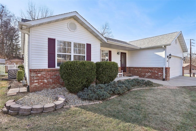 ranch-style house with a front yard and a garage