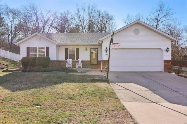 ranch-style house featuring a front lawn, a porch, and a garage