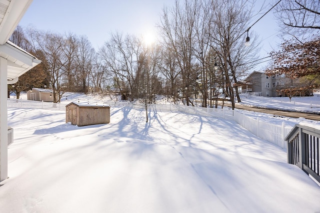 view of yard covered in snow