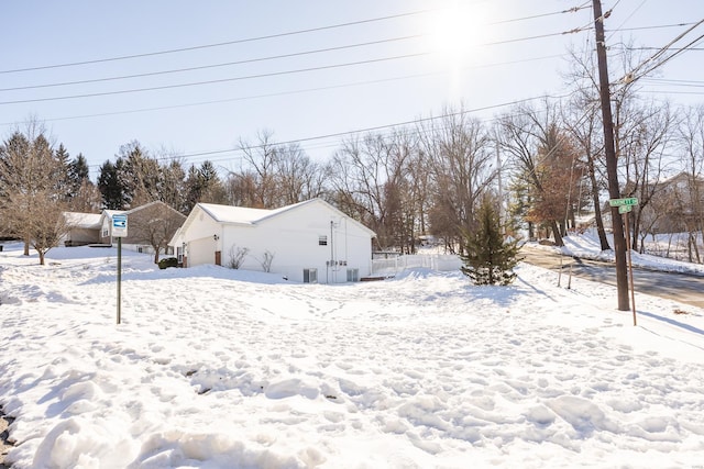 view of yard covered in snow