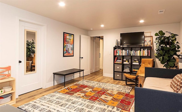 living room with wood-type flooring