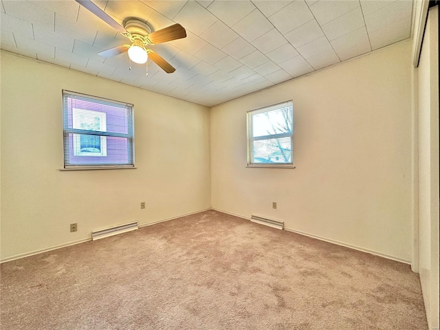 unfurnished room featuring ceiling fan and light carpet