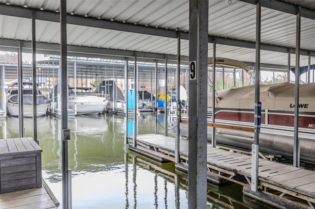 dock area featuring a water view