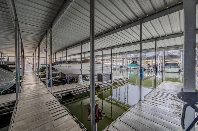 dock area featuring a water view