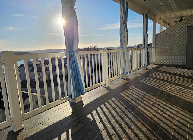 wooden terrace with ceiling fan