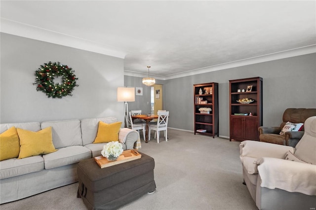 carpeted living room with a notable chandelier and crown molding