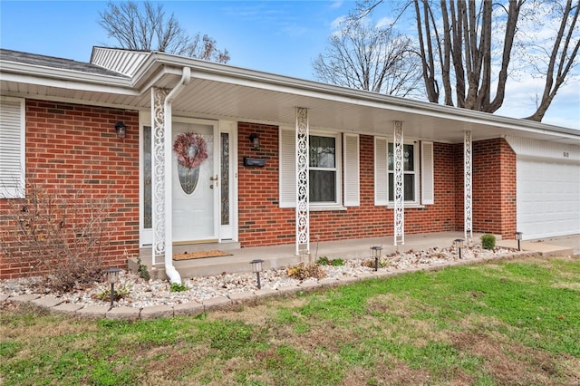 view of exterior entry featuring a garage