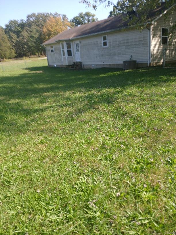 view of yard with cooling unit