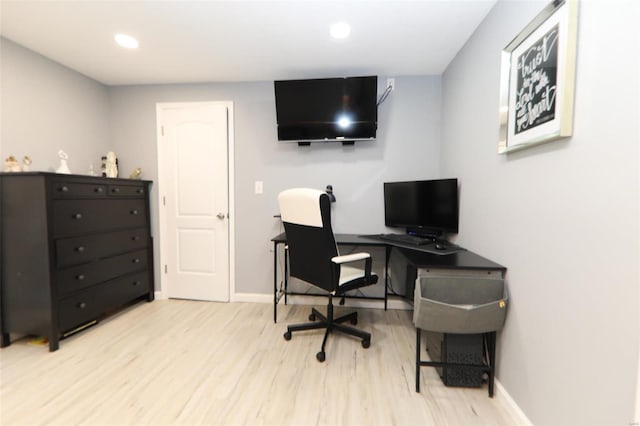 home office featuring light hardwood / wood-style flooring