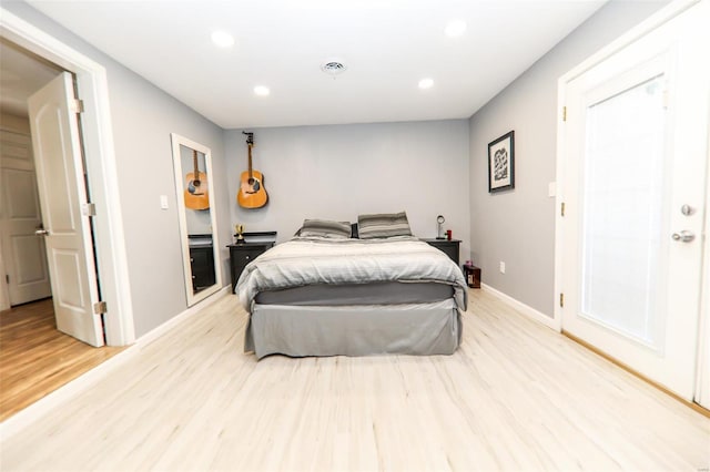 bedroom with light hardwood / wood-style floors