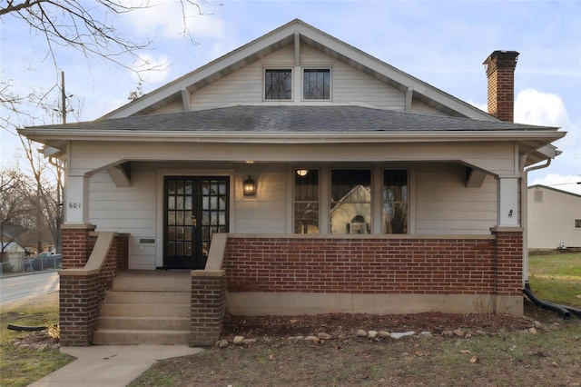 bungalow-style house featuring covered porch